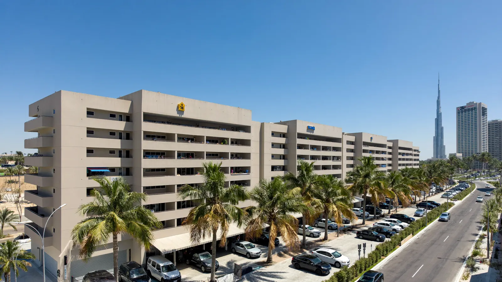 Residential streets and buildings in Dubai Production City, Dubai, served for AC repair